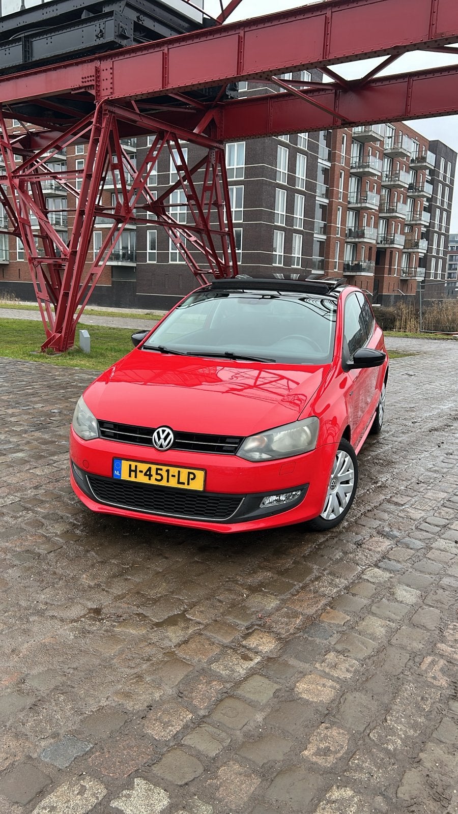Volkswagen Polo 1.2 51KW 2013 Rood, Auto's, Voorwielaandrijving, 967 kg, 40 €/maand, 1198 cc