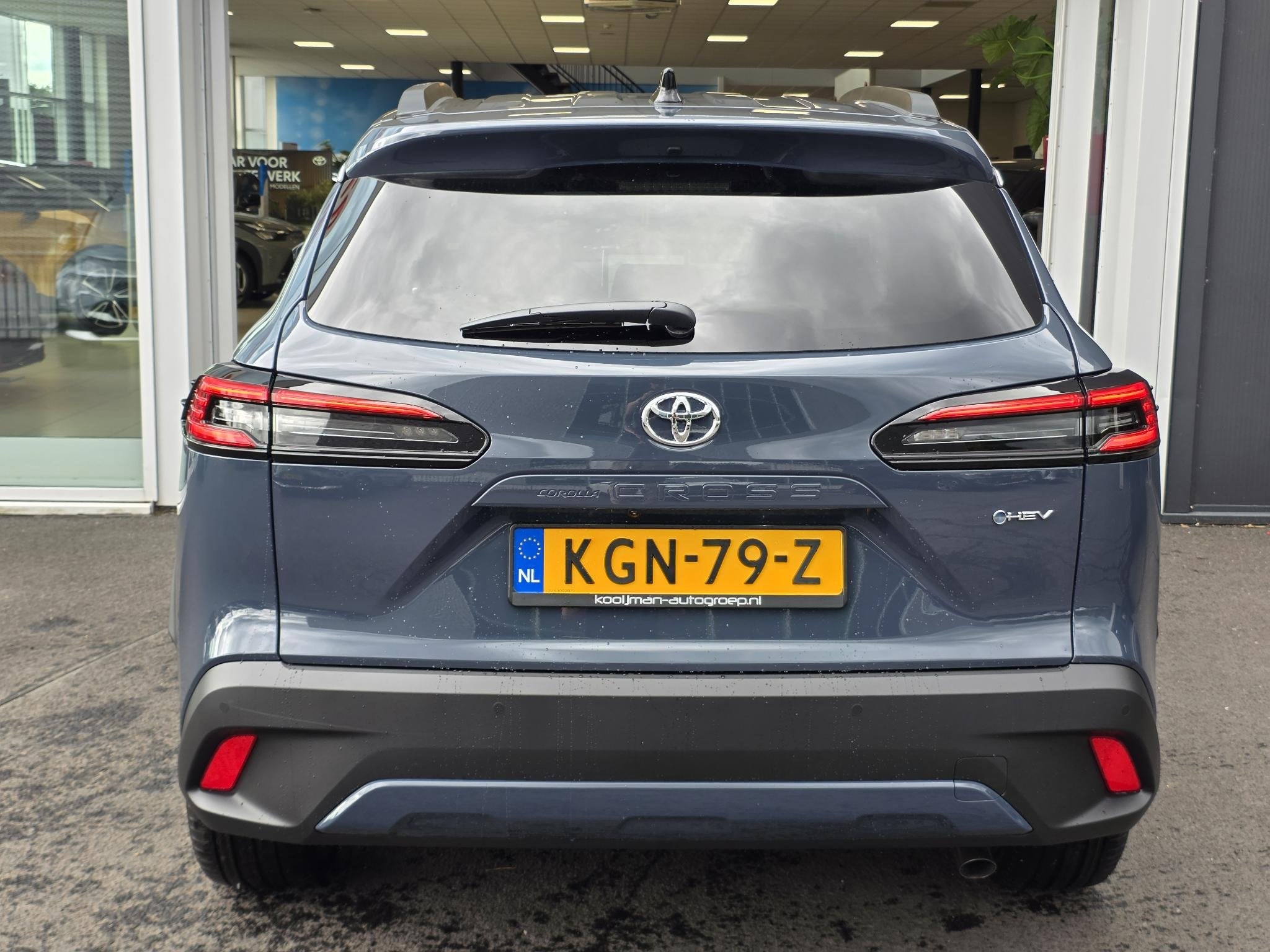 Toyota Corolla Cross Hybrid 180 Dynamic, Auto's, Stof, Gebruikt, 4 cilinders, 179 pk