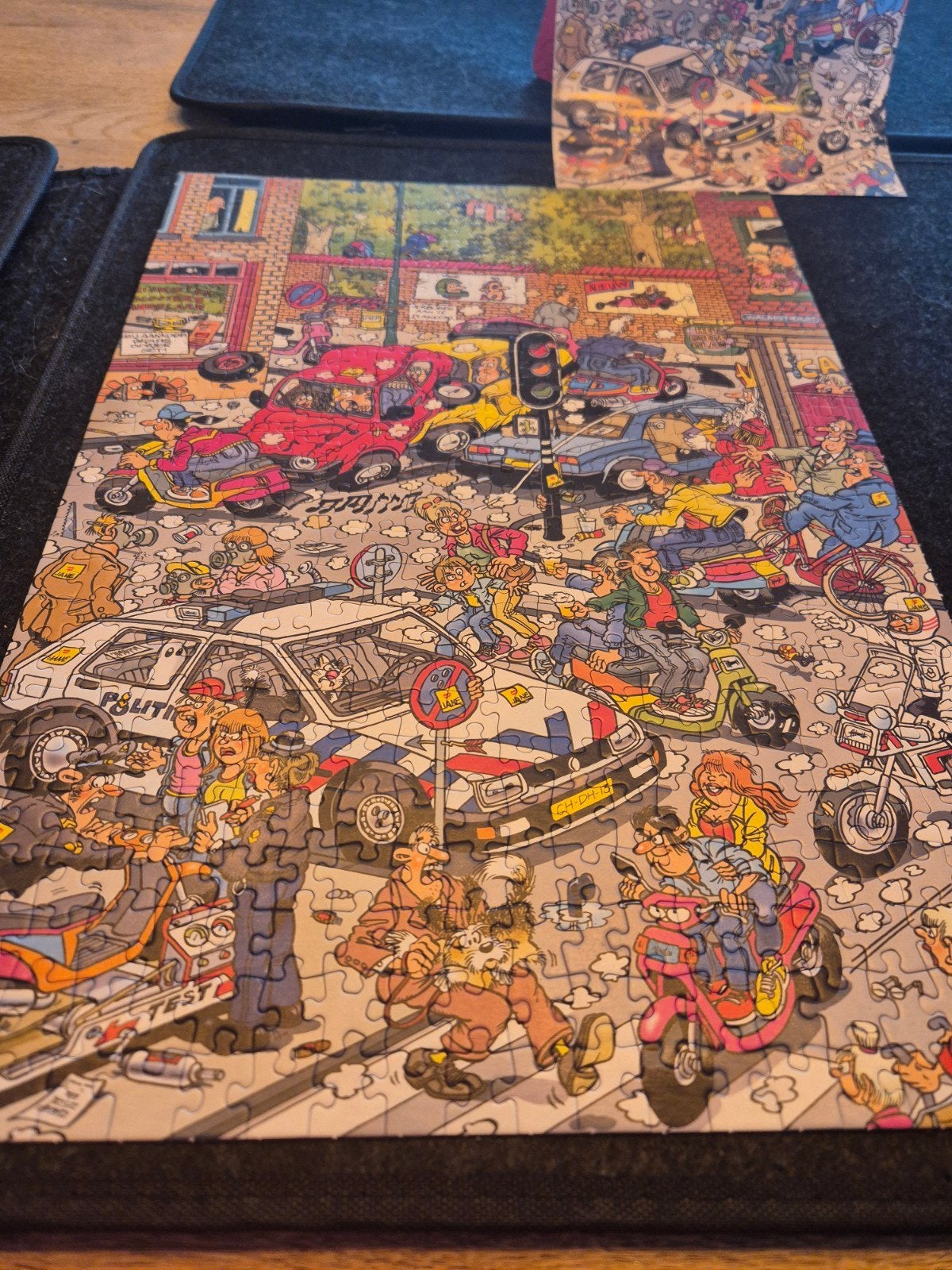 Jan van Haasteren Legpuzzel - De Verkeerschaos, Hobby en Vrije tijd, Denksport en Puzzels, Ophalen of Verzenden, 500 t/m 1500 stukjes