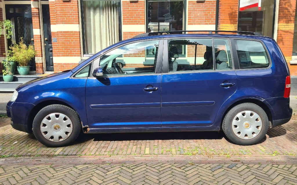Volkswagen Touran 1.6 85KW 2006 Blauw, Stof, 4 cilinders, Blauw, Origineel Nederlands