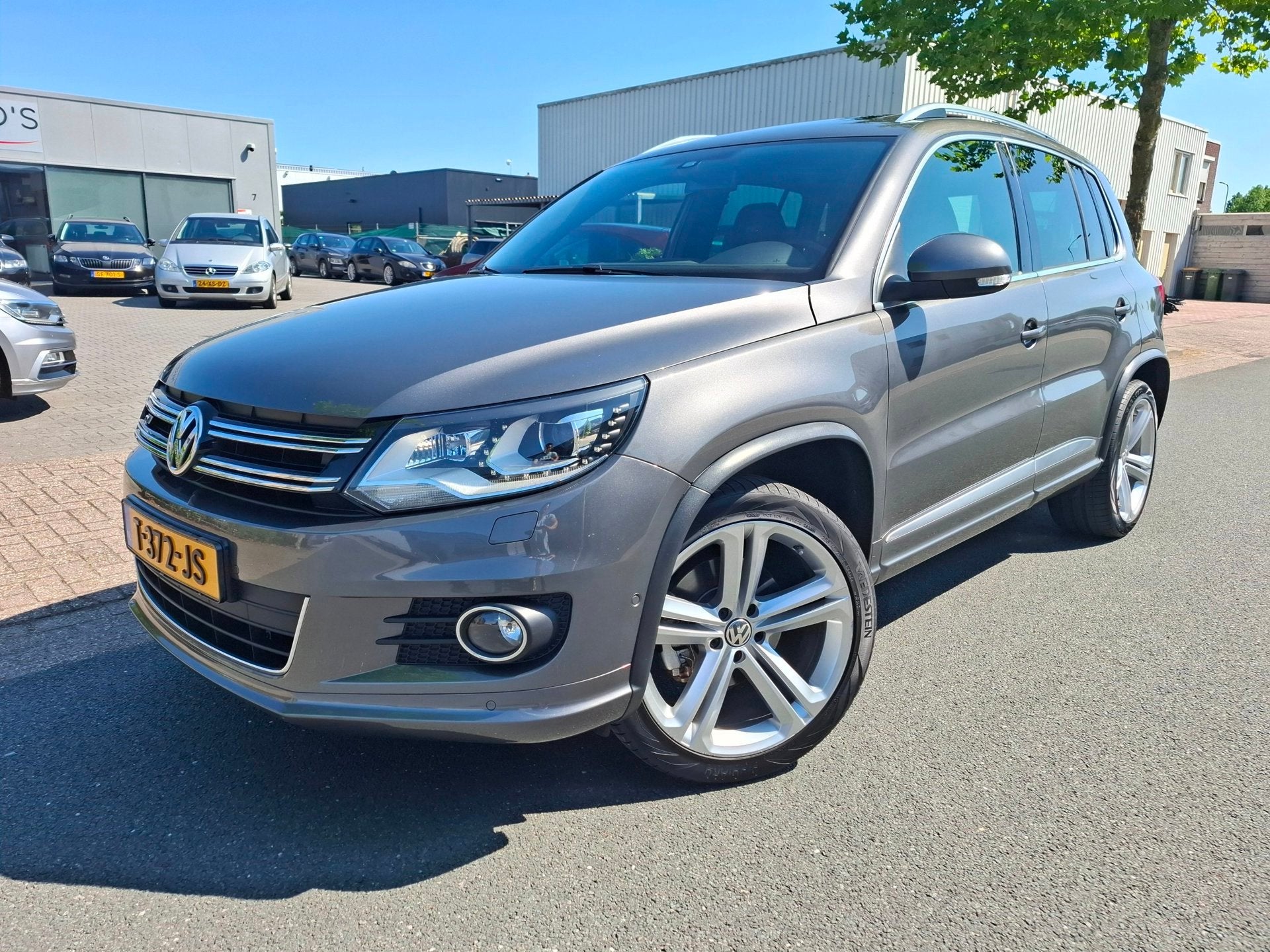 Volkswagen Tiguan 1.4 TSI R-line Edition PANO/XENON/NAVI/CAM, Auto's, Voorwielaandrijving, Euro 5, 15 km/l, Zwart