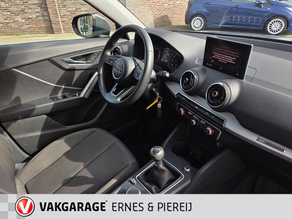 Audi Q2 1.0 TFSI S-Line *Garantie mogelijk tot 14-08-2028, Auto's, Audi, Voorwielaandrijving, Stof, Gebruikt, 116 pk
