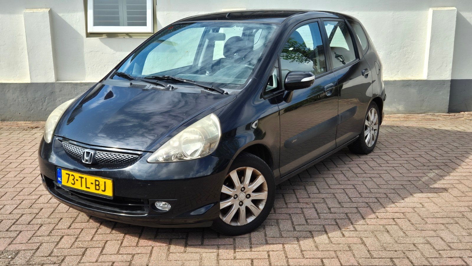 Honda Jazz 1.4 I AUTOMAAT/2006 Zwart >Handel/export, Auto's, 83 pk, 40 €/maand, 4 cilinders, Zwart