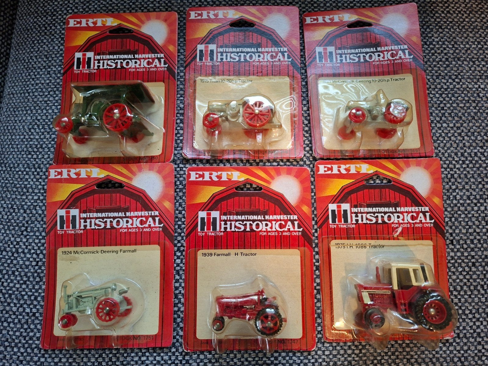 International Harvester historical set 1/64 ertl, Ophalen of Verzenden, Zo goed als nieuw, Tractor of Landbouw