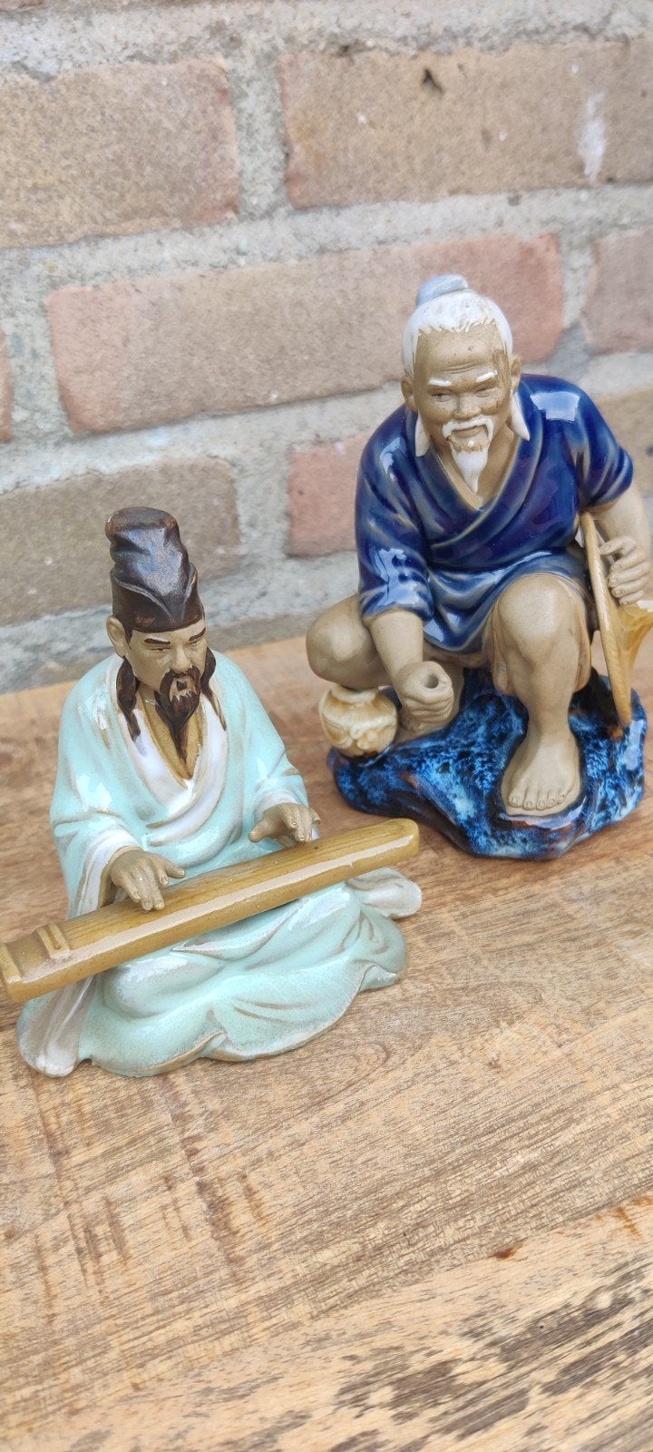 Set van 2 Oosterse beeldjes: muzikant en visser, Ophalen of Verzenden