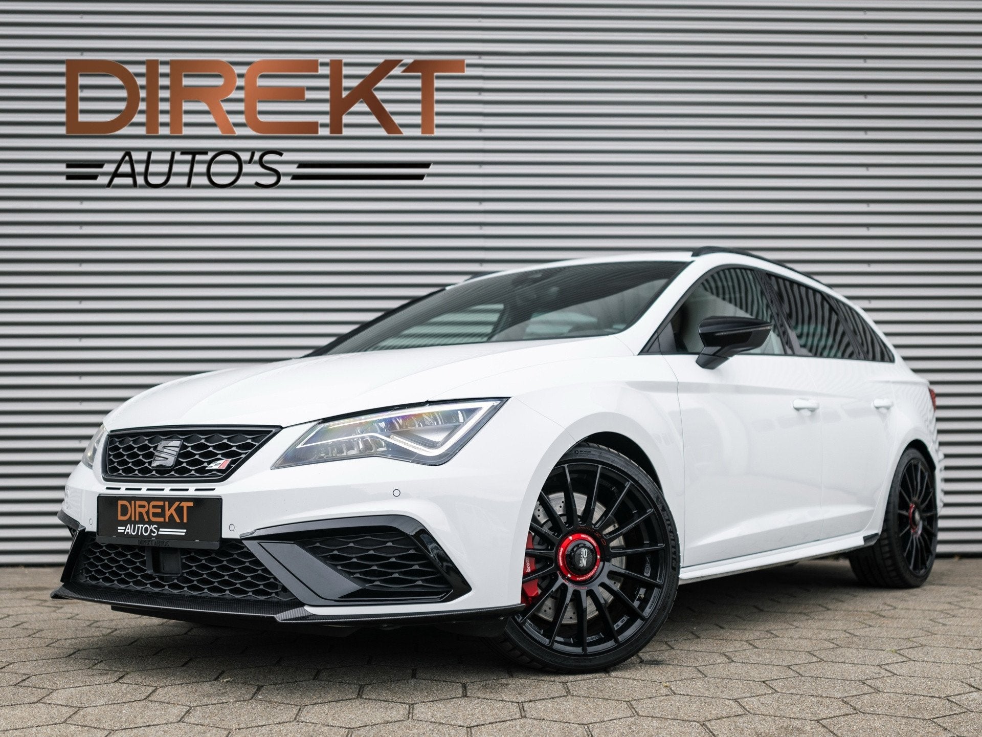 SEAT Leon ST 2.0 TSI CUPRA 4DRIVE CARBON EDITION PANO BREMBO, Auto's, Automaat, Gebruikt, Zwart, 4 cilinders