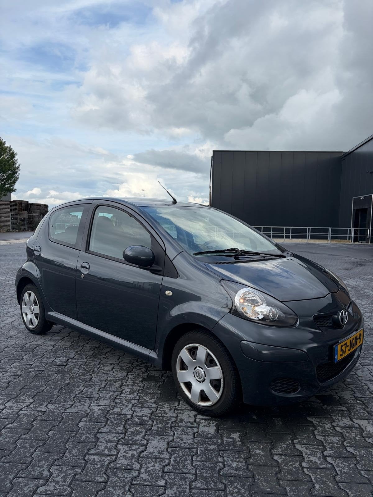 Toyota Aygo 1.0 12V Vvt-i 5DRS 2009 Grijs, Auto's, Voorwielaandrijving, 4 stoelen, 68 pk, Origineel Nederlands