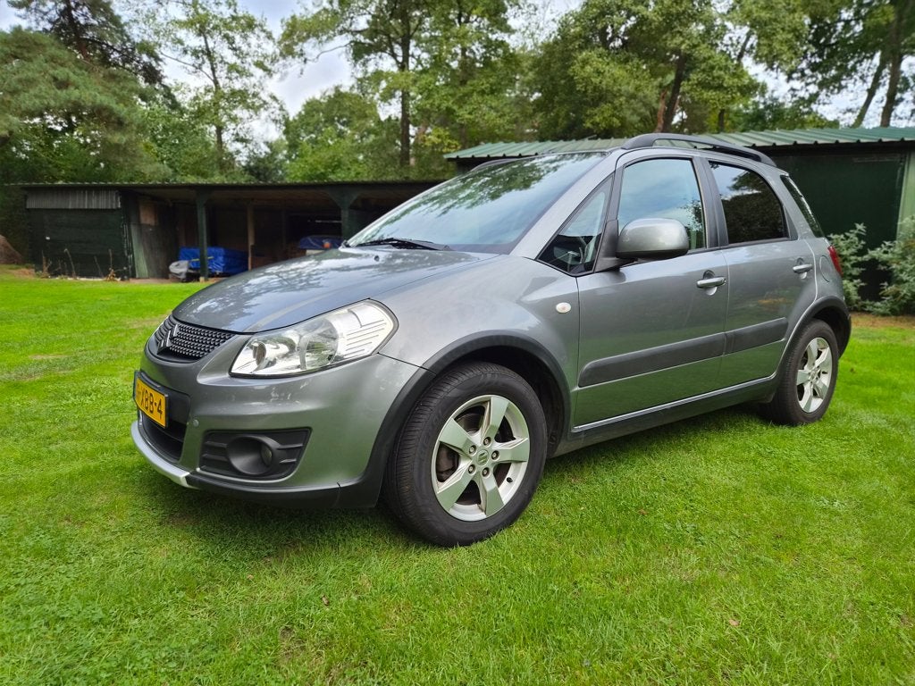 Suzuki SX4 1.6 AUT 2012 Grijs, Auto's, 4 cilinders, 49 €/maand, Origineel Nederlands, 1200 kg