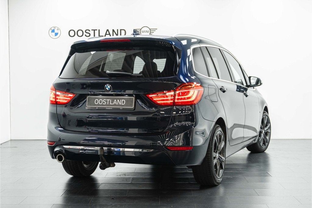 BMW 2 Serie Gran Tourer 218i 7p. Executive Automaat / Sports, Auto's, BMW, Gebruikt, Blauw, 3 cilinders, Automatische klimaatregeling