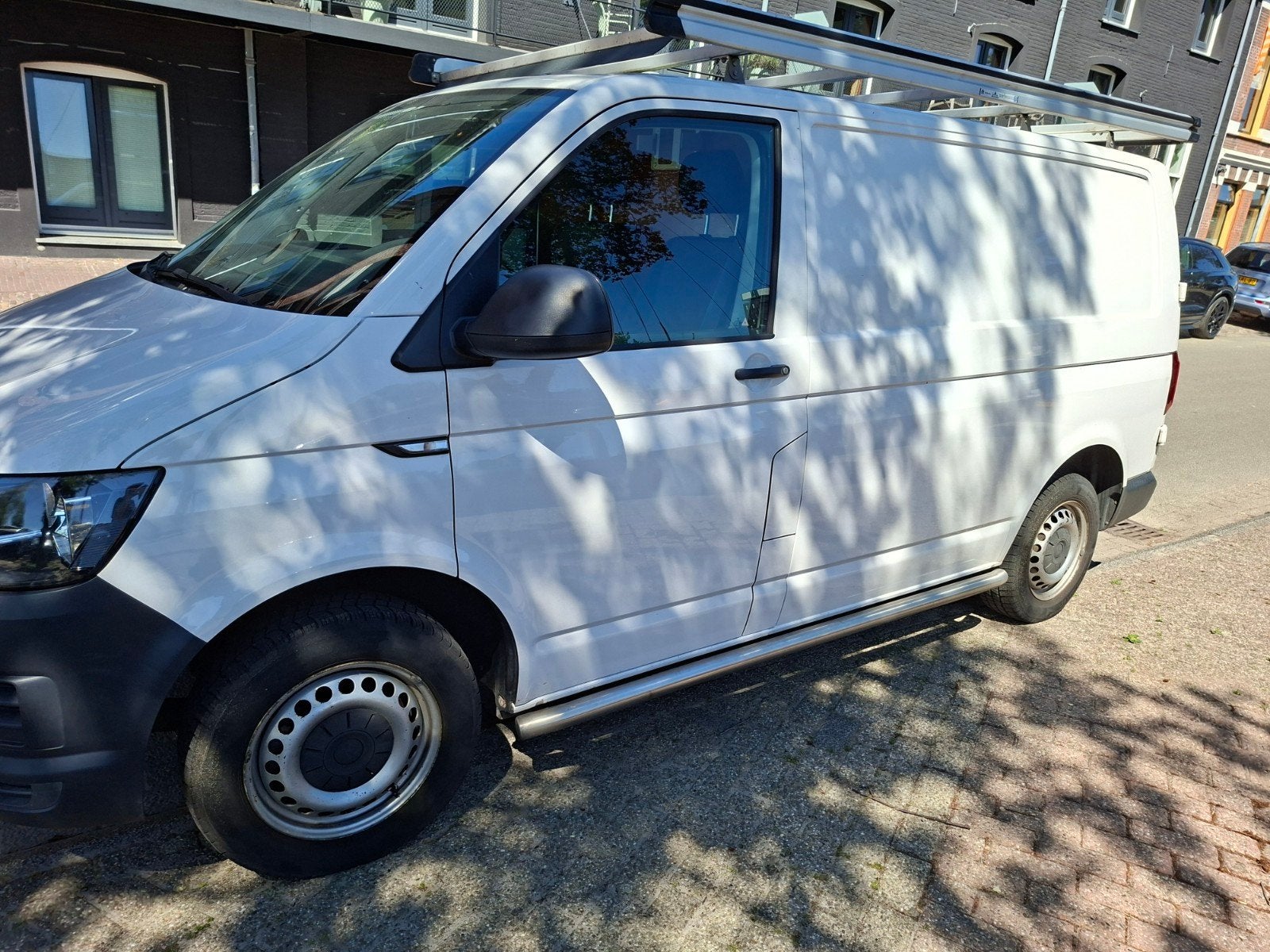 VW Transporter 2.0 TDI (2017) |170.000 km | Airco | Trekhaak, Voorwielaandrijving, Elektrische ramen, Stof, 1772 kg