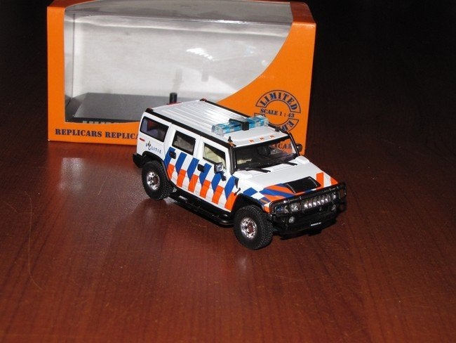 Een hele mooie rijkspolitie Hummer politie Nederland 1/43, Ophalen of Verzenden, Zo goed als nieuw, Auto, Overige merken