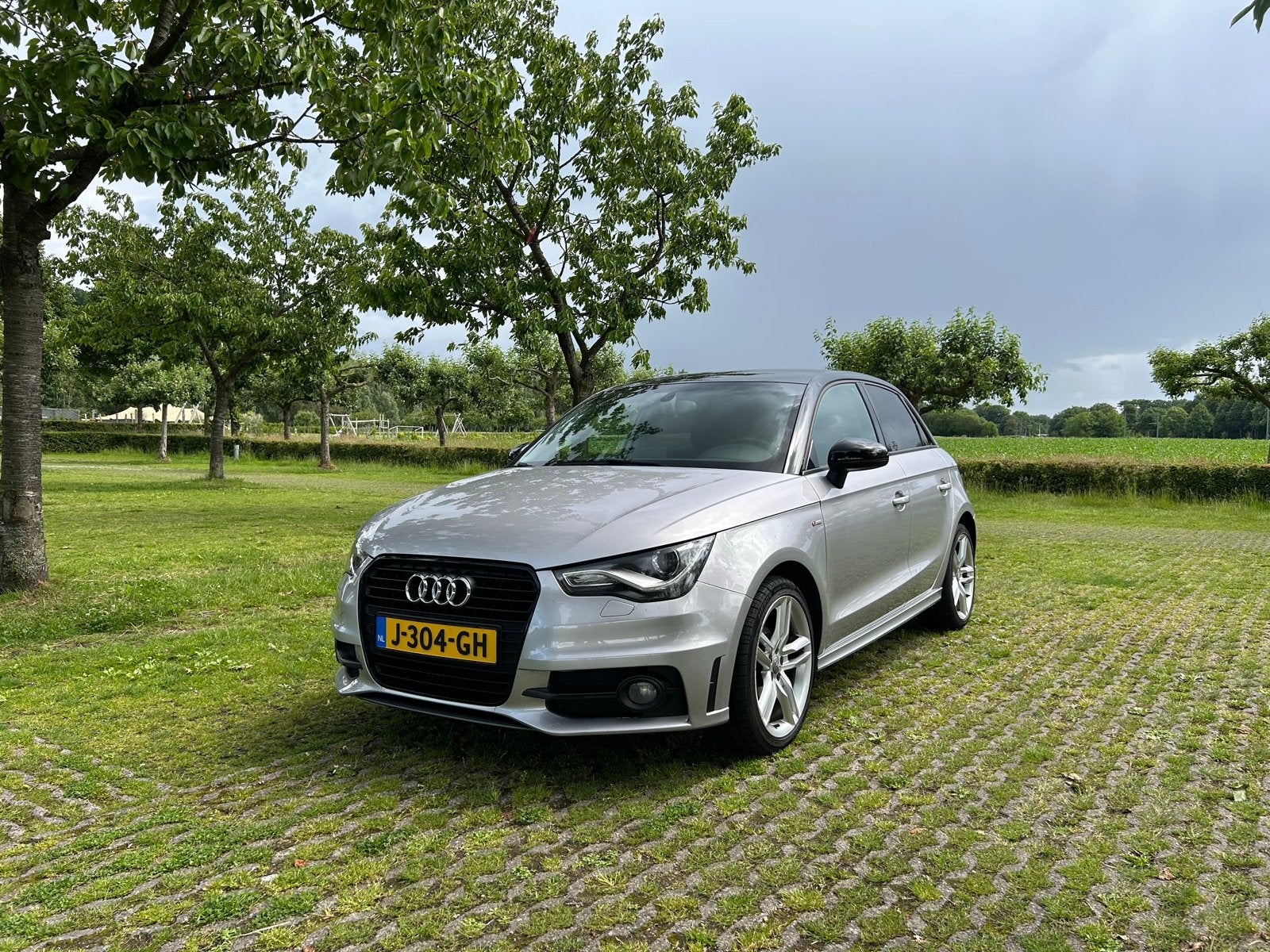 Audi A1 1.2 Tfsi 63KW SB 2014 Grijs, Auto's, Voorwielaandrijving, Euro 5, Stof, Zwart