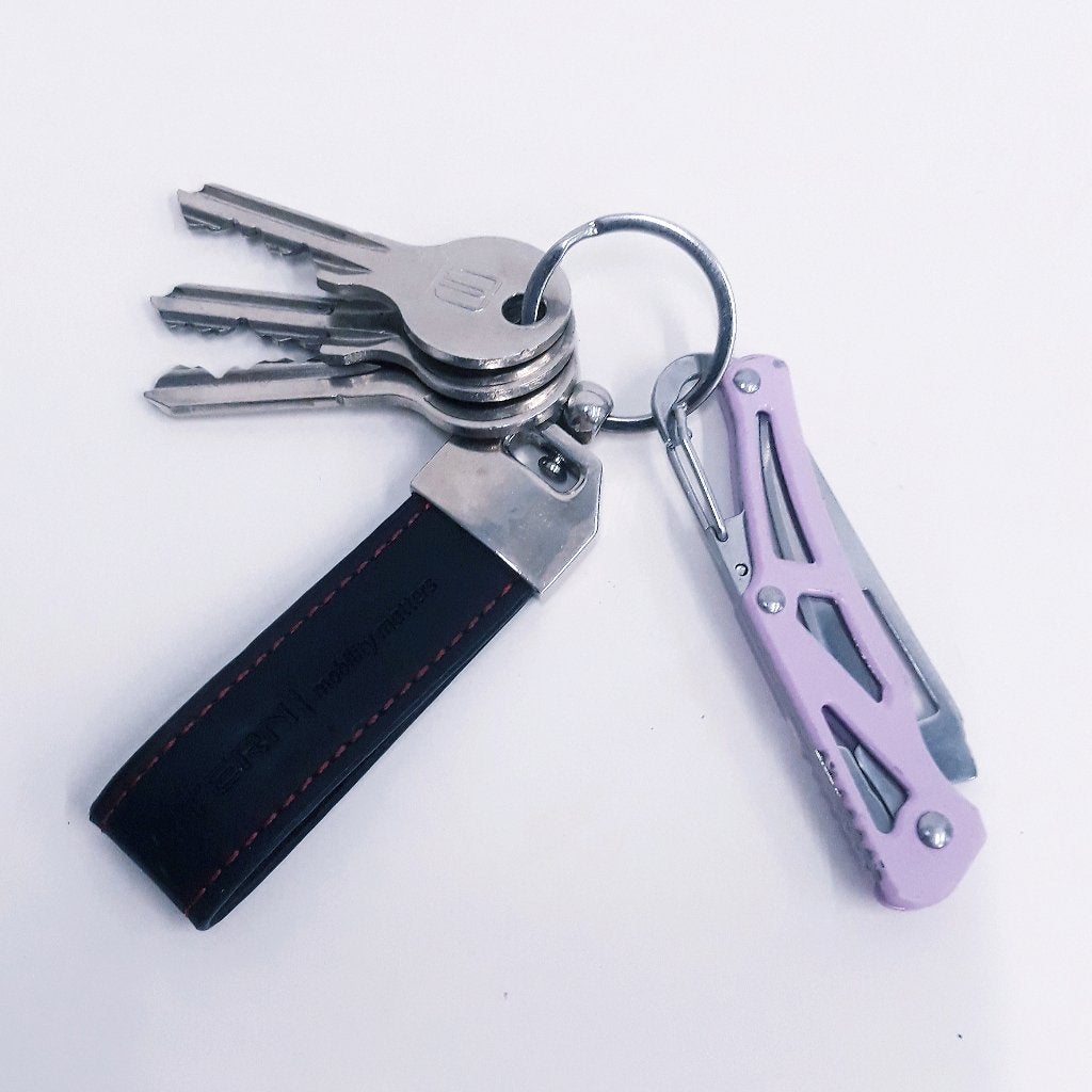 M06 Lila, sleutelhanger zakmes., Verzenden, Nieuw, Overige typen