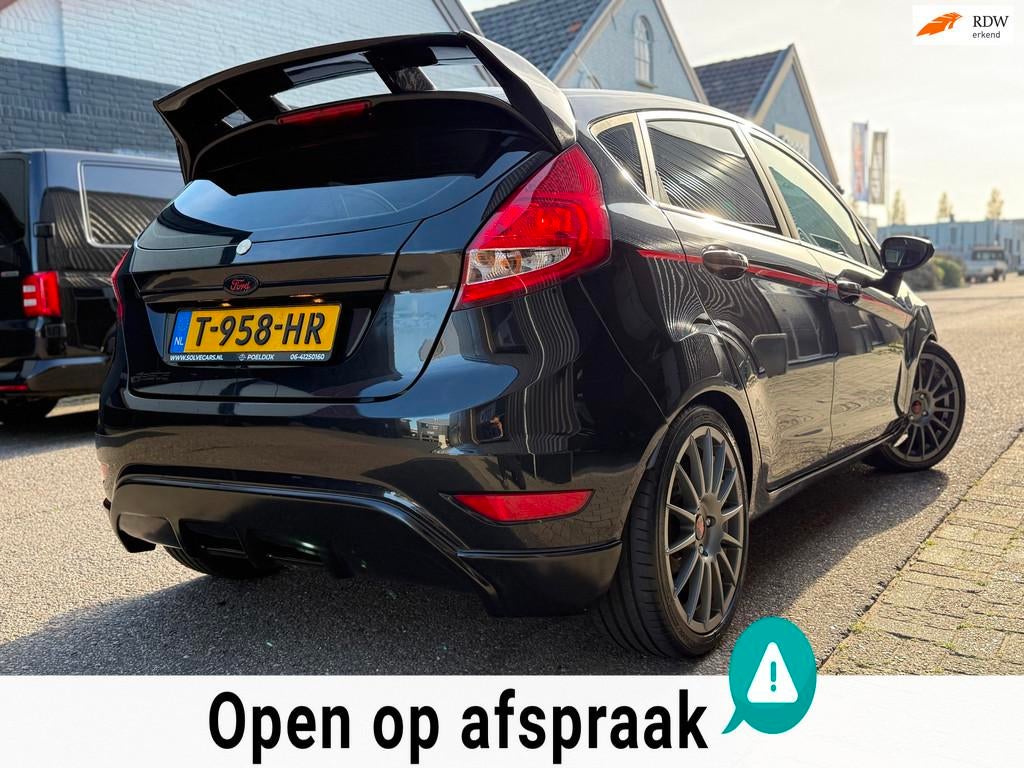 Ford Fiesta 1.25 Ghia UITLAATKLEP LED STOEL VERWARMING, Auto's, Voorwielaandrijving, Euro 5, Met garantie (alle), 82 pk