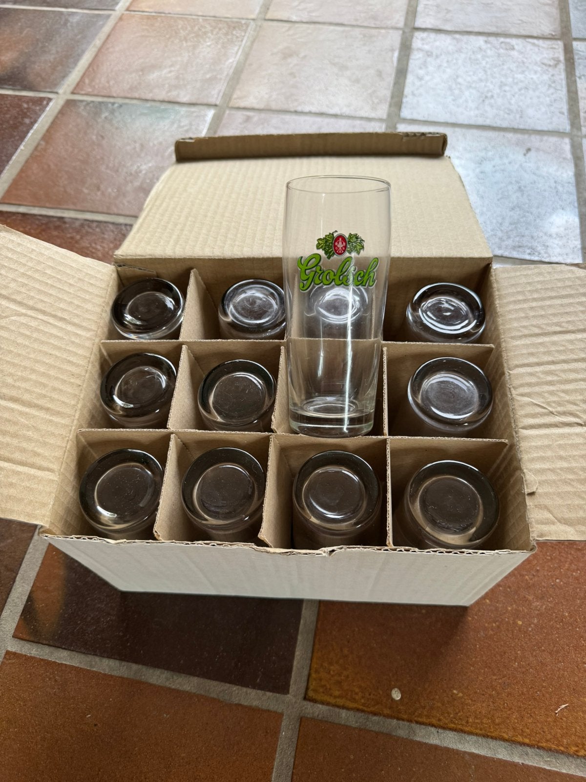 12 Grolsch bierglazen (fluitjes), Ophalen of Verzenden, Zo goed als nieuw, Glas of Glazen, Grolsch