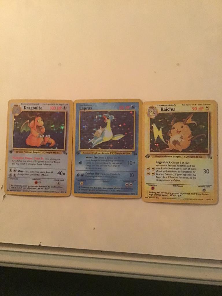 Dragonite Lapras Raichu 1ste Edition Fossil Holo, Verzenden, Zo goed als nieuw, Meerdere kaarten, Foil