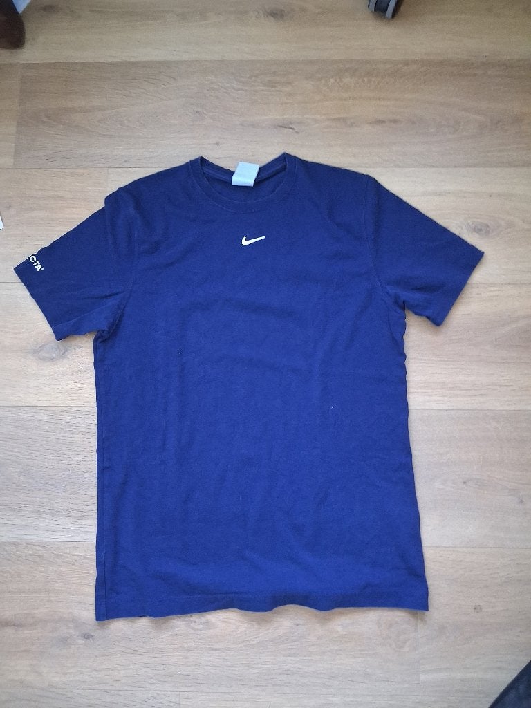 Nike NOCTA T-shirt - Blauw - Maat M, Kleding | Heren, T-shirts, Nike, Ophalen of Verzenden, Zo goed als nieuw, Maat 48/50 (M)