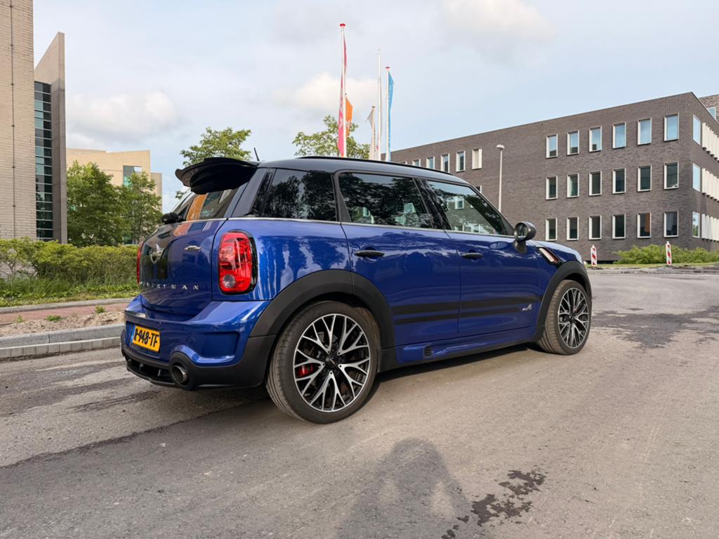 Mini Countryman 1.6 John Cooper Works AUT 2015 Blauw, Auto's, Blauw, 75 €/maand, Vierwielaandrijving, Particulier