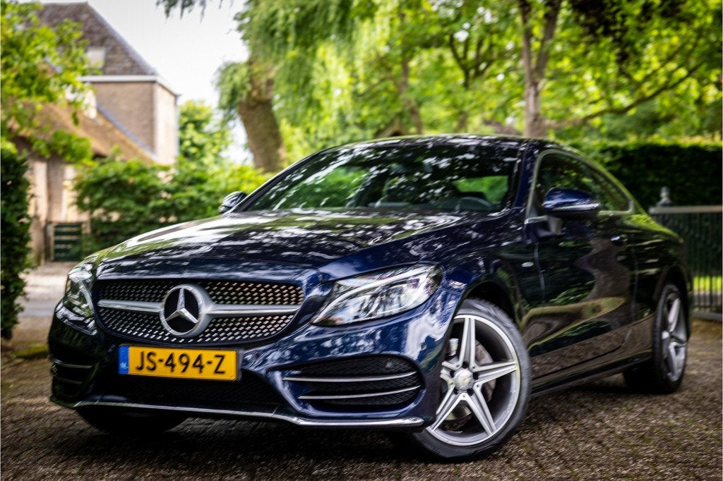 Mercedes-Benz C-Klasse Coupé 180 AMG Line Camera LED Dode H, Automaat, Achterwielaandrijving, Leder en Stof, 1405 kg