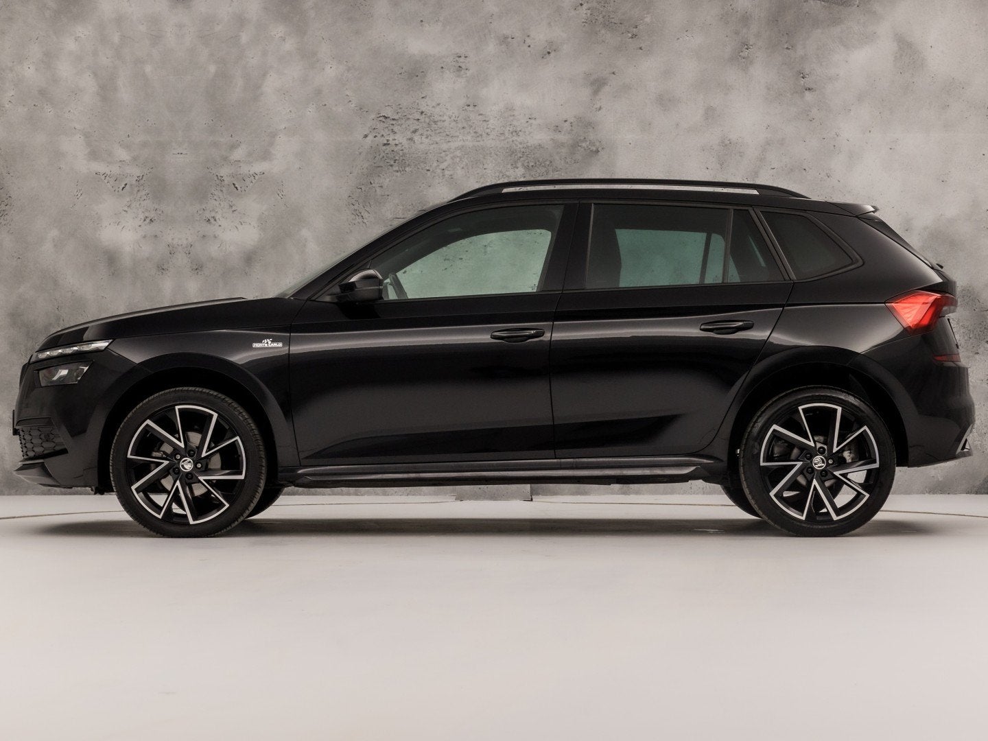 Skoda Kamiq 1.0 TSI Monte Carlo Automaat (PANORAMADAK, VIRTU, 12 maanden, Stof, Zwart, 3 cilinders