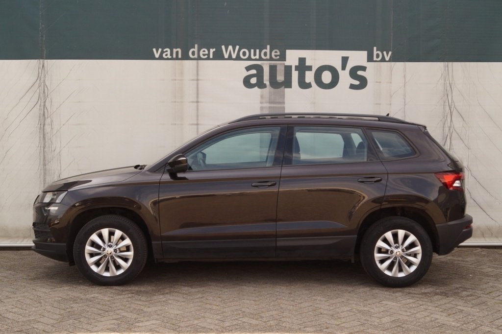 Skoda Karoq 1.5 TSI 150pk DSG Business Edition -NAVI-ECC-PDC, Auto's, Dealer onderhouden, Stof, 4 cilinders, Bedrijf