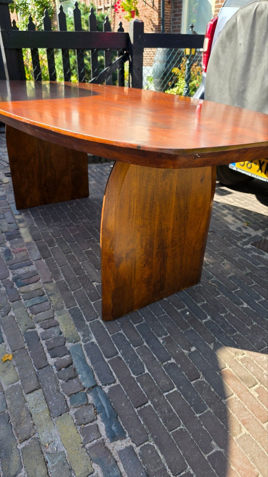 ovale notenhouten designtafel, Ophalen