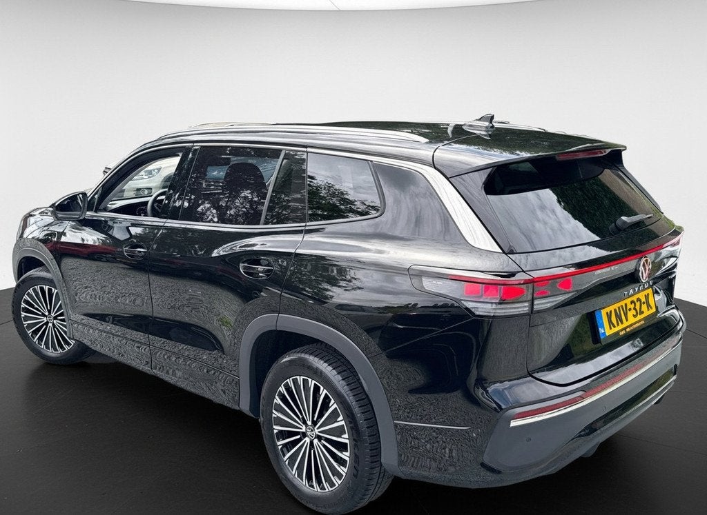Volkswagen Tayron 1.5 eHybrid PHEV 204PK ELEGANCE 360°CAMER, Auto's, Volkswagen, 12 maanden, 4 cilinders, Leder en Stof, Zwart