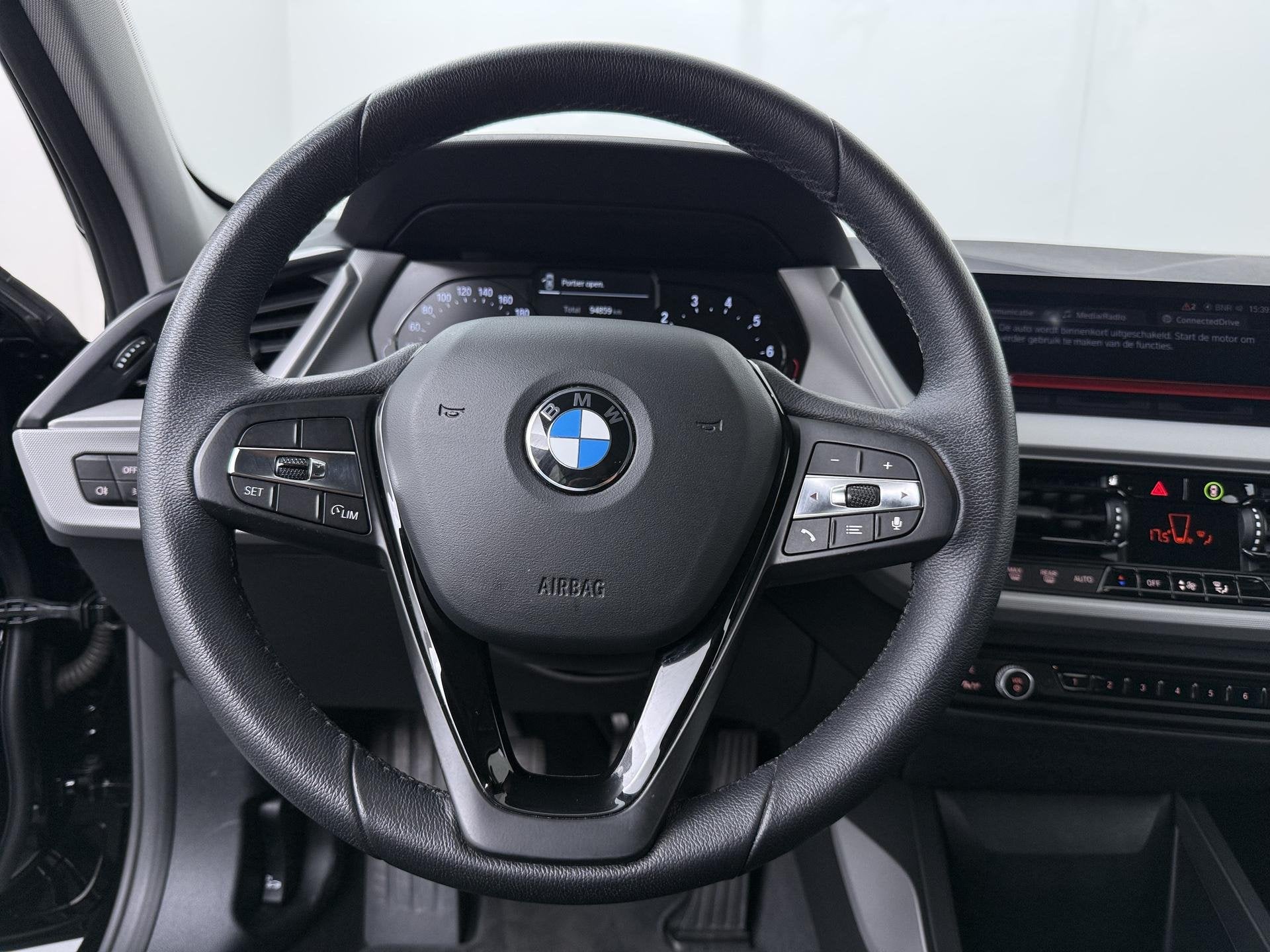 BMW 1-serie 116i | Handgeschakeld | DAB | Climate Control |, Auto's, Stof, Gebruikt, Met garantie (alle), Zwart