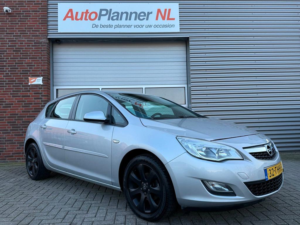 Opel Astra 1.4 Turbo Edition! Airco! Cruise! Navi! PDC!, Voorwielaandrijving, Euro 5, Stof, Gebruikt