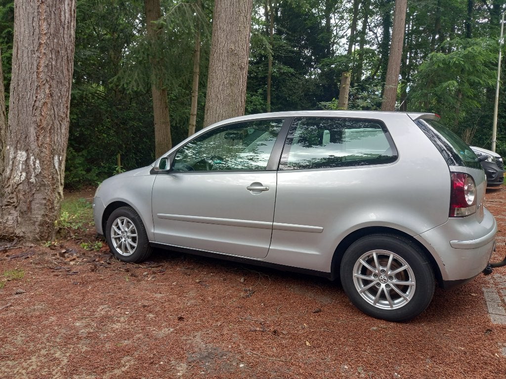 Volkswagen Polo 1.4 55KW AUT 2006 Grijs, Auto's, Stof, 74 pk, 4 cilinders, Origineel Nederlands