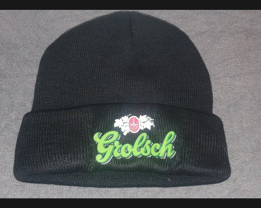 Stijlvol en warm: zwarte grolsch muts blijf comfortabel warm, Verzamelen, Ophalen of Verzenden, Nieuw, Grolsch