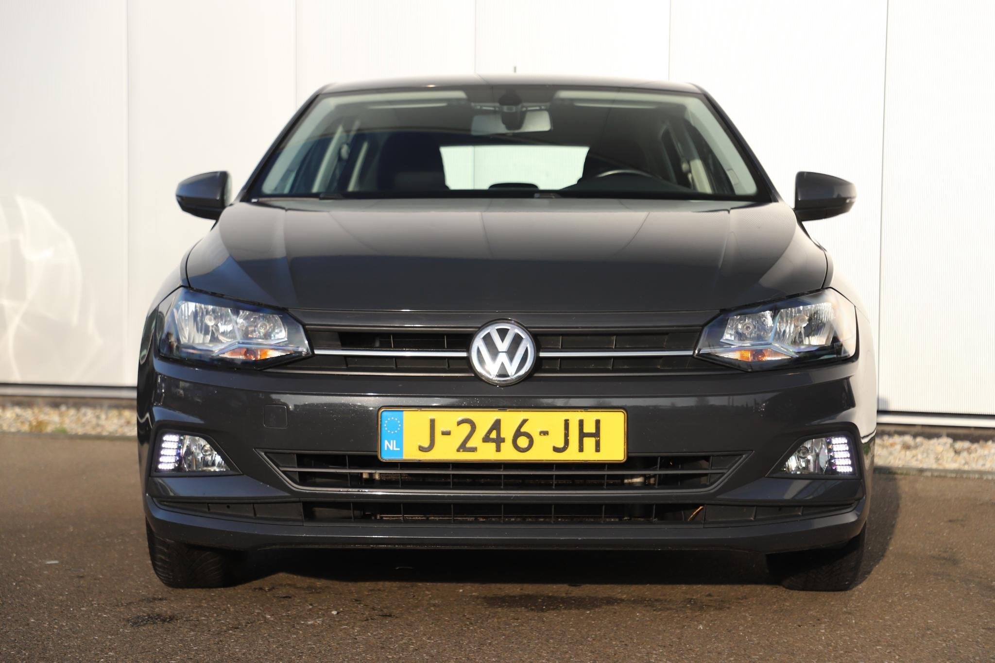 Volkswagen Polo 1.0 TSI Comfortline 95PK NAP Clima 15 inch L, Auto's, Voorwielaandrijving, Stof, Gebruikt, 95 pk