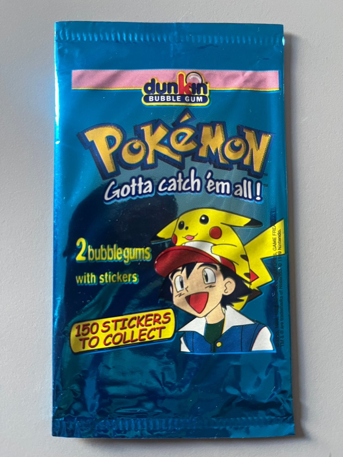 Pokemon booster empty dunkin bubblegums Pikachu/ash, Ophalen of Verzenden, Gebruikt, Booster