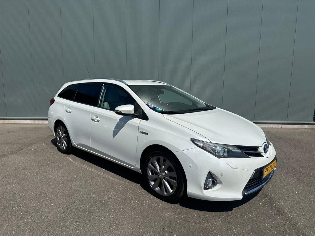 Toyota Auris Touring Sports 1.8 Hybr. Lease LEDER | CAMERA |, Auto's, Toyota, Automaat, Euro 5, 4 cilinders, Wit
