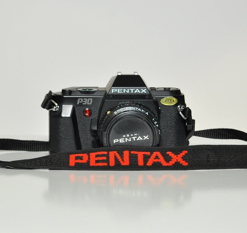 Pentax P30 met 28 mm lens + extra lens+ flitser, Ophalen of Verzenden, Gebruikt, Spiegelreflex, Pentax