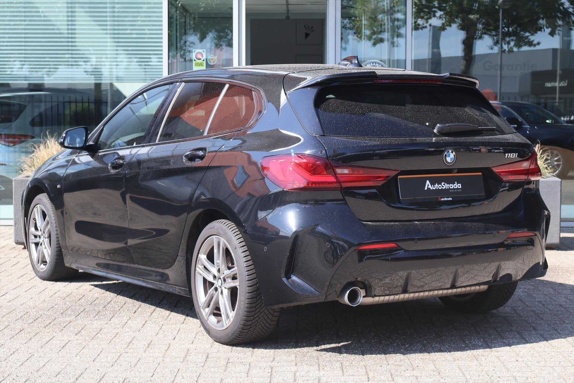 BMW 1-Serie (f40) 118i M-Sport Aut | Camera I Carplay | LED, 136 pk, Met garantie (alle), Leder en Stof, Zwart
