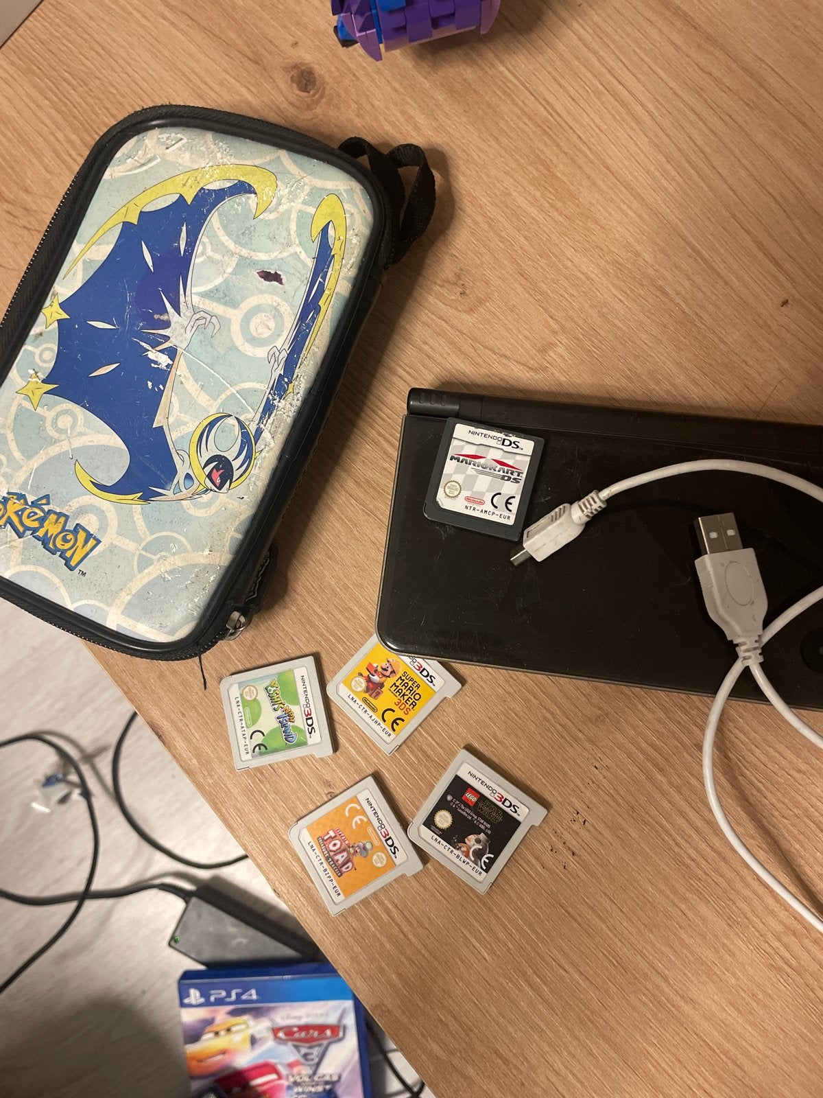 Nintendo DS met spellen en Pokémon hoesje, Ophalen of Verzenden, Gebruikt