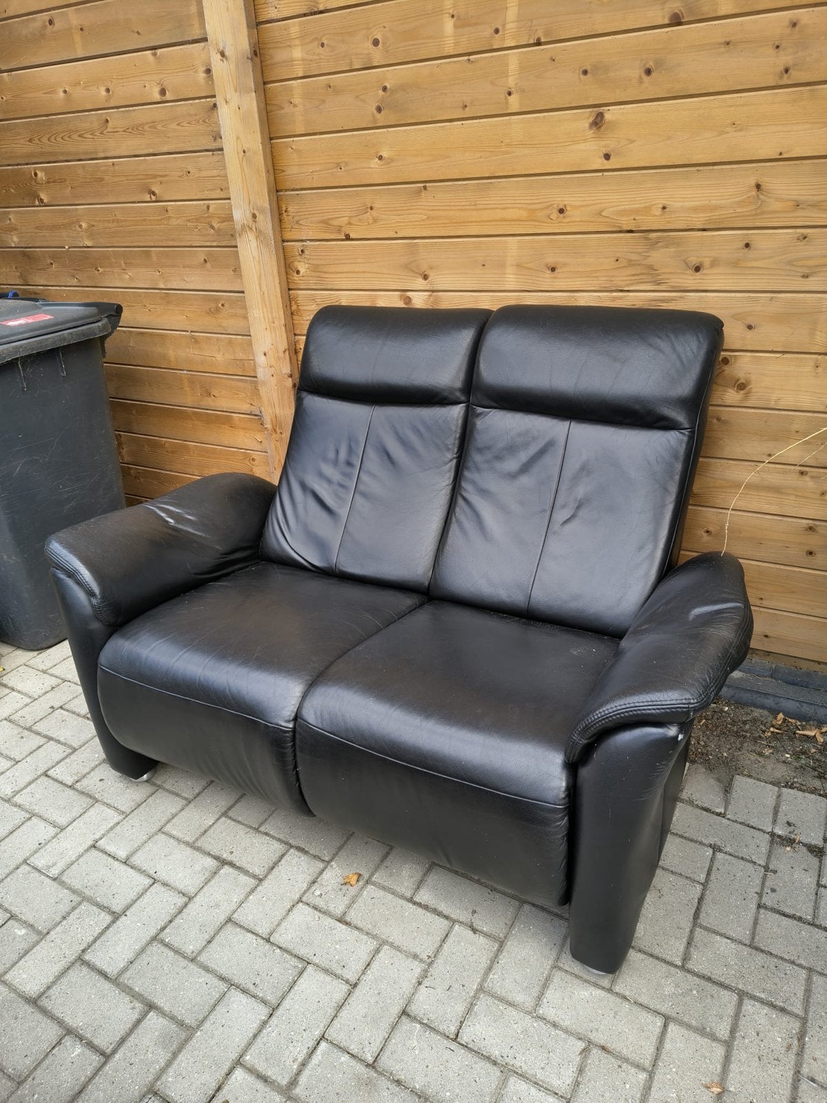 Zwarte leren tweezits relaxbank, Huis en Inrichting, Ophalen, Gebruikt, 150 tot 200 cm, Tweepersoons
