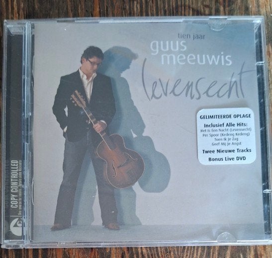 Guus Meeuwis - Tien Jaar Levensecht (CD + DVD), Inclusief DVD, Ophalen of Verzenden, Zo goed als nieuw, Pop
