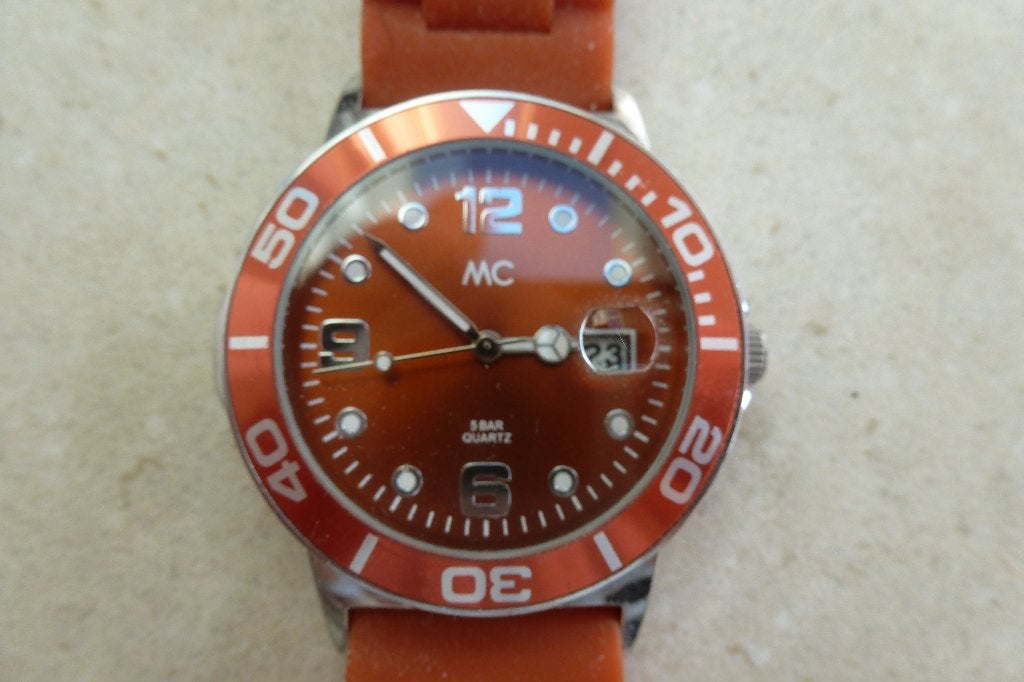 Horloge oranje! Merk MC, Ophalen of Verzenden, Gebruikt, Kunststof, Overige merken