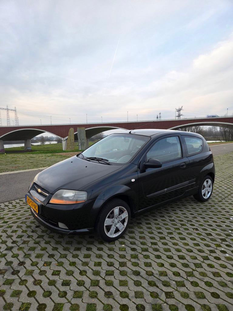 Chevrolet Kalos 1.2 3D 2006 Zwart, Auto's, Voorwielaandrijving, 1150 cc, 40 €/maand, 4 cilinders