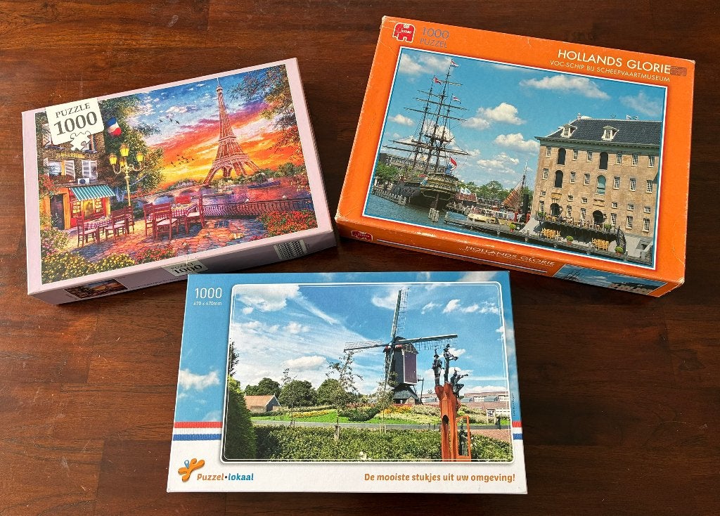 drie puzzels 1000 stukjes, Hobby en Vrije tijd, Denksport en Puzzels, Ophalen of Verzenden, 500 t/m 1500 stukjes, Gebruikt, Legpuzzel