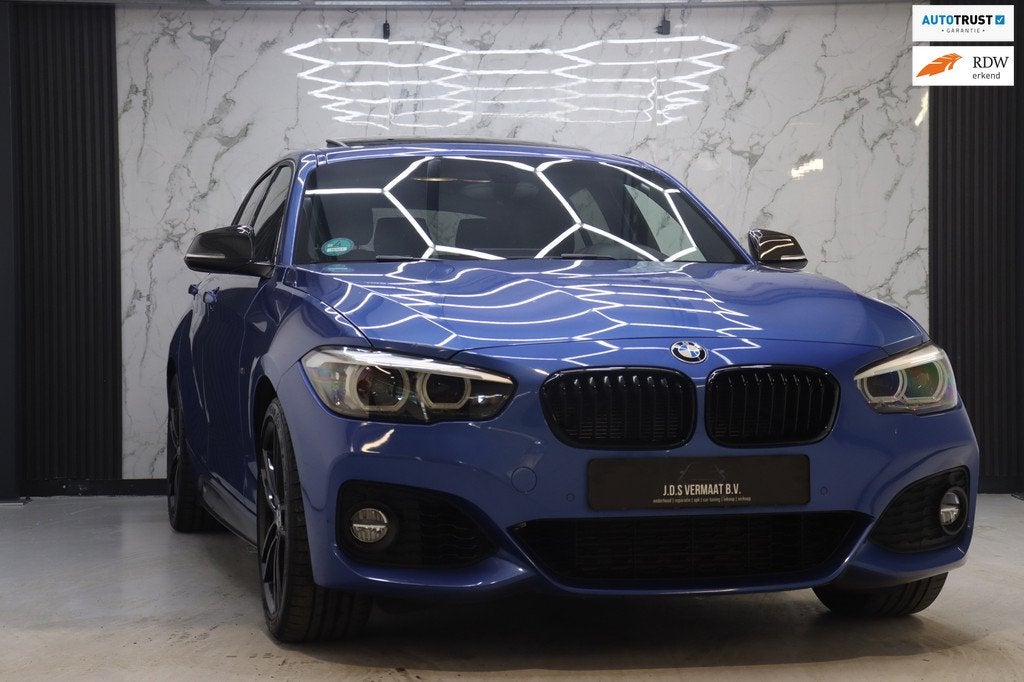 BMW 1-serie 118i Edition M Sport Shadow Executive, Auto's, Gebruikt, Blauw, Bedrijf, 650 kg