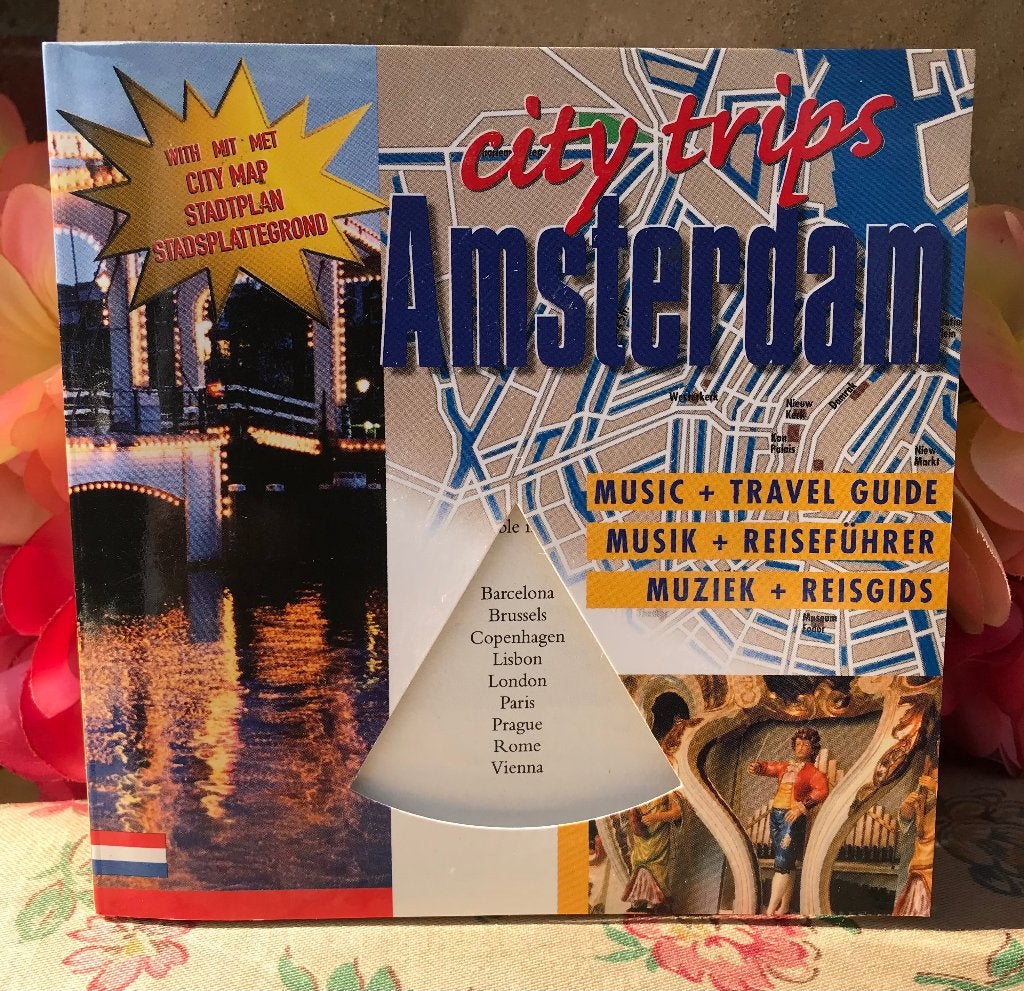 Citytrip boekje Amsterdam met CD, Ophalen of Verzenden, Nieuw in verpakking, Levenslied of Smartlap