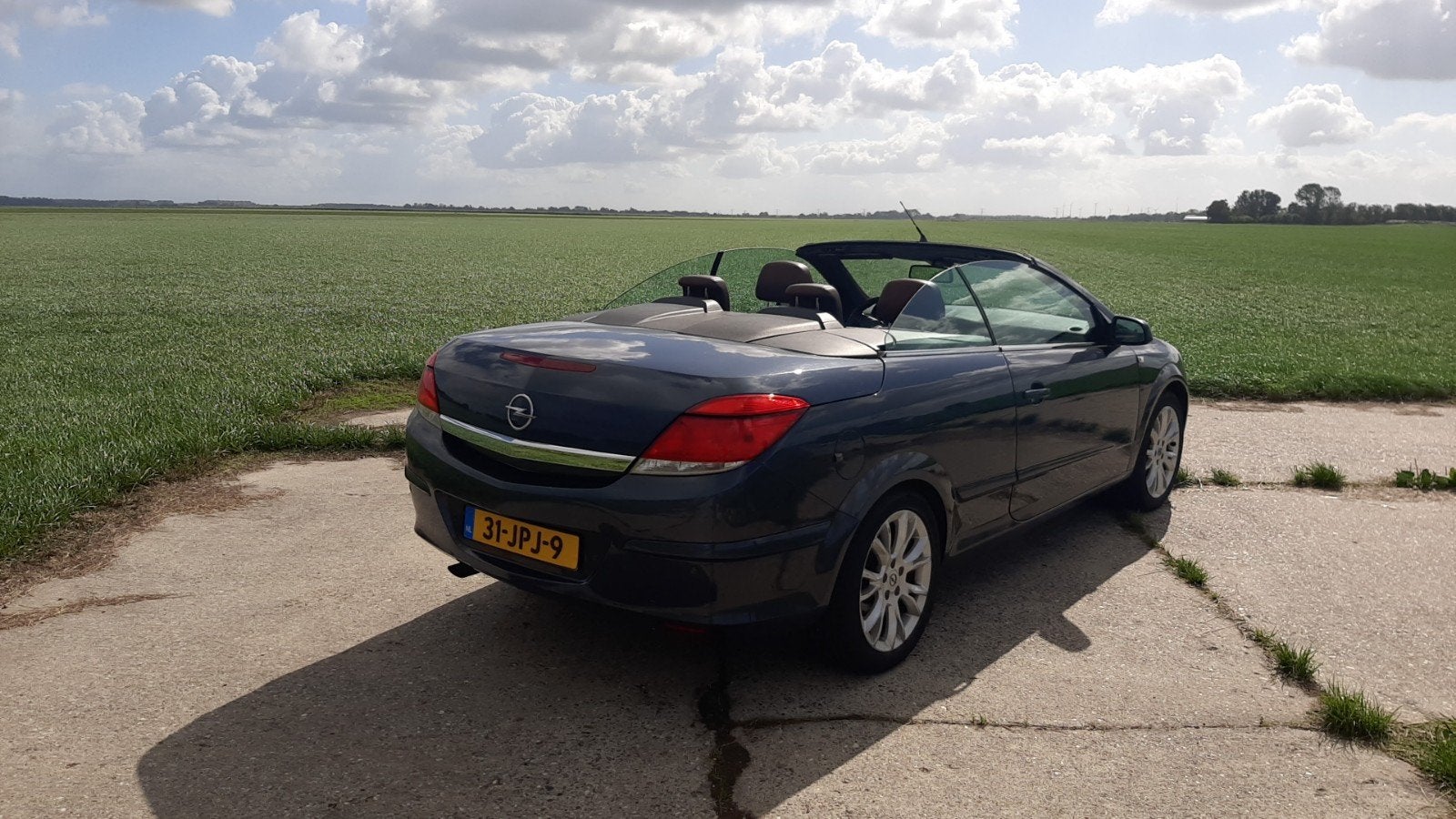 Opel Astra 1.8 16V Twintop 2009 Grijs, Auto's, Voorwielaandrijving, 4 cilinders, Cabriolet, 4 stoelen