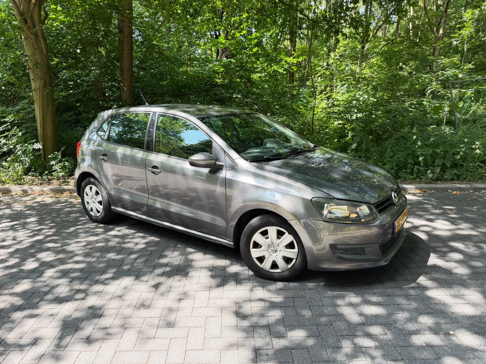 Volkswagen Polo 1.2 51KW 2009 Grijs, Voorwielaandrijving, Stof, Handgeschakeld, Particulier