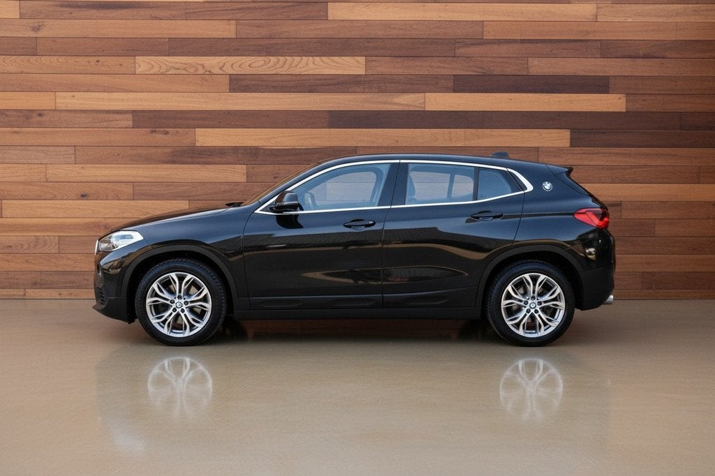 BMW X2 sDrive18i | SPORT STOELEN | 18"LMV | TREKHAAK, Auto's, BMW, Gebruikt, Met garantie (alle), Zwart, 3 cilinders