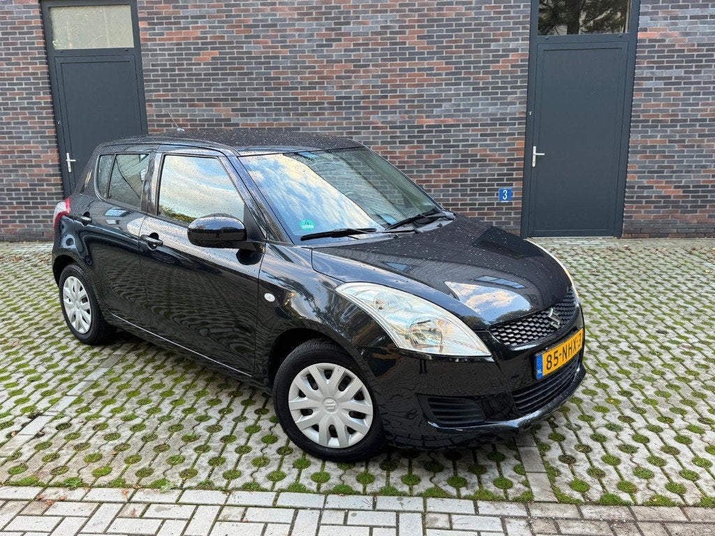 Suzuki Swift 1.2 5-D 2010 Zwart Eerste eigenaar | Dealeronde, Voorwielaandrijving, Dealer onderhouden, Stof, 4 cilinders