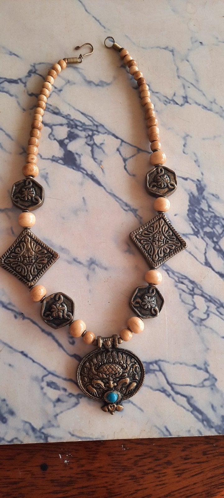 Oude etnische ketting ,Garuda,met amulet en turkoois., Ophalen of Verzenden, Overige materialen, Ketting, Met edelsteen