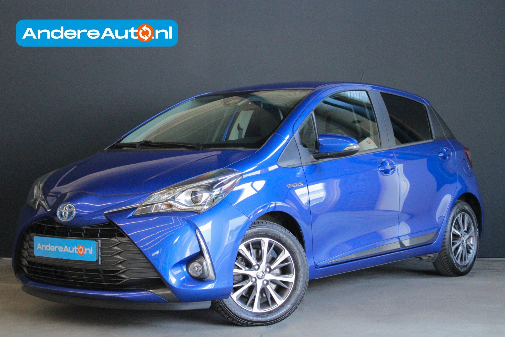 Toyota Yaris 1.5 Hybrid Y20 |stoelverwarming|navigatie|parke, Gebruikt, Zwart, 4 cilinders, Blauw